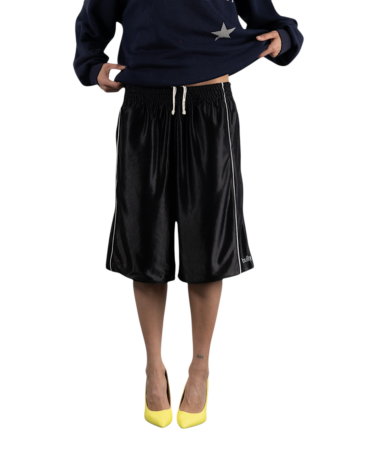BULLY LA black raschel knit polyester bully shorts featuring silver contrast piping and embroidered logo detail