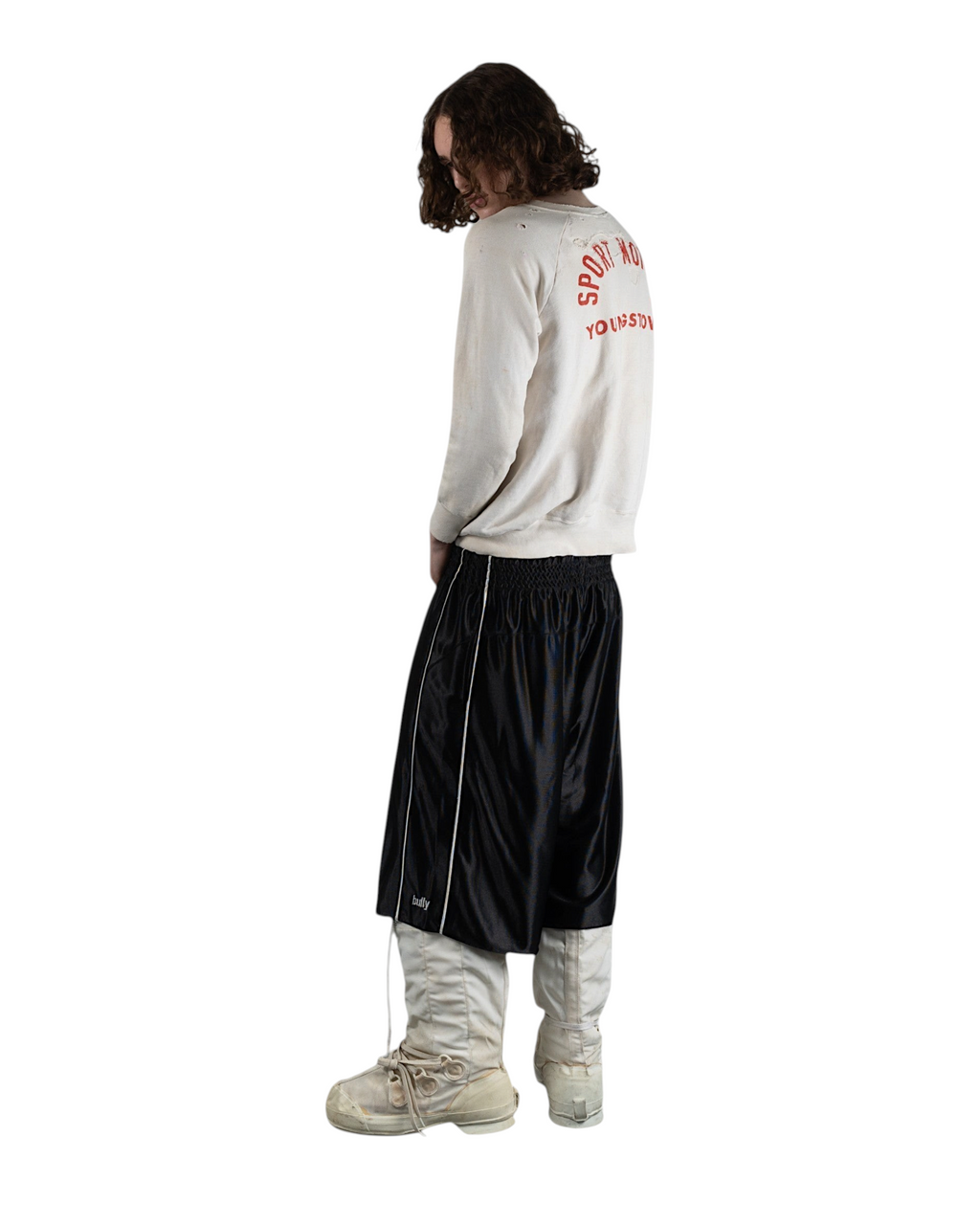 BULLY LA black raschel knit polyester shorts with silver contrast piping, side pockets, and embroidered logo.